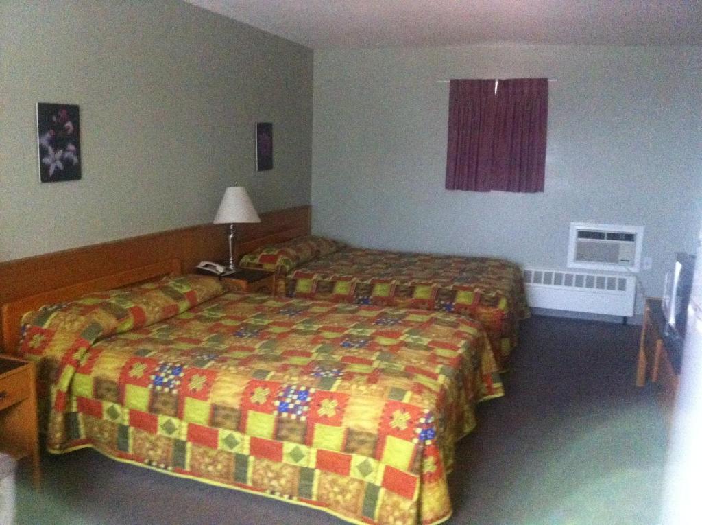 Raccoon Lodge Motel Sylvan Lake Rum bild