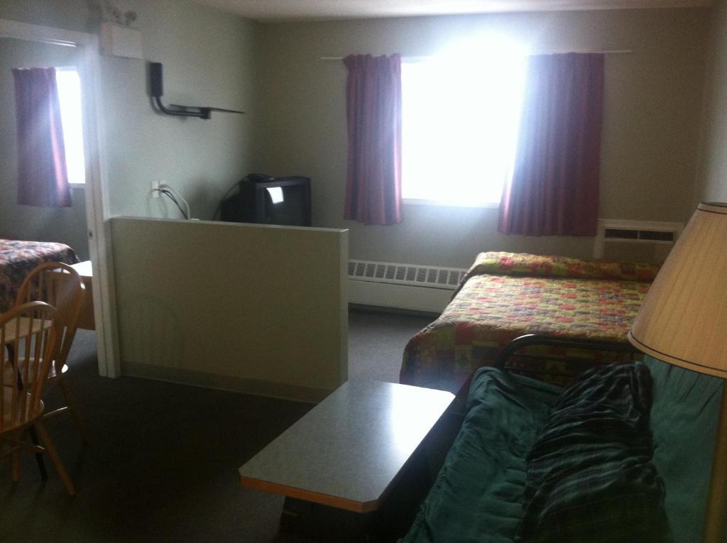 Raccoon Lodge Motel Sylvan Lake Rum bild